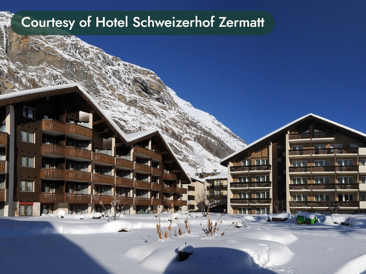 A hotel in deep snow below the mountains of Zermatt, Switzerland. Courtesy of Hotel Schweizerhof Zermatt.