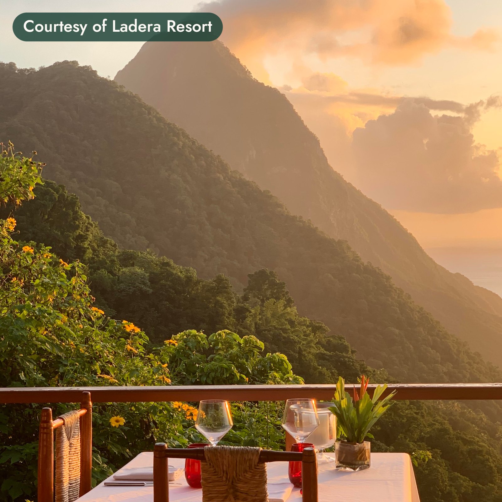 A table set for two on a terrace facing the Pitons in St. Lucia. Courtesy of Ladera Resort.